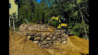 Building a Rock Retaining Wall with a Mini Excavator