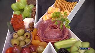 Charcuterie Letter Boxes: This creative take on a meat and cheese tray elevates any event