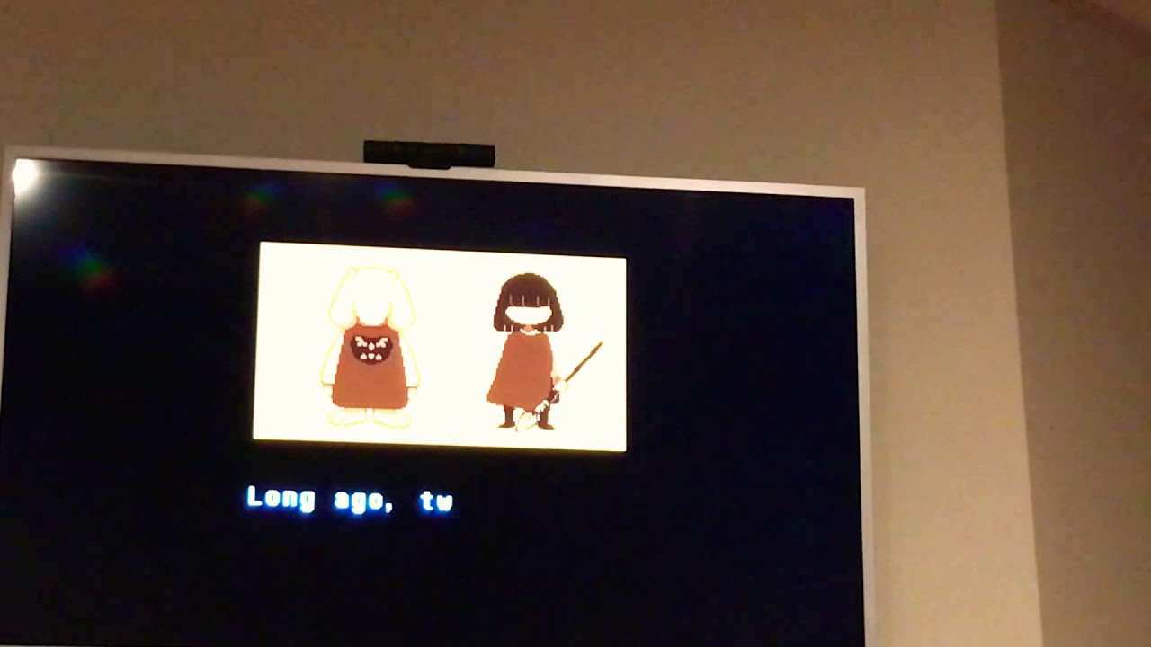 A boy playing undertale And shadow of war