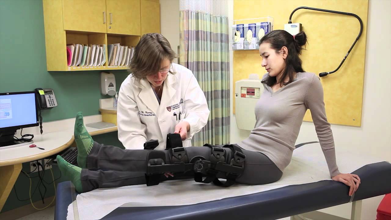 How to put on a T Scope post-op knee brace - Boston Children's Hospital 