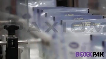 BoxxPak semi-automatic case packing system for loading pouches into cases