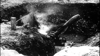 French mortar fired from trench emplacement; French Army forces advance on battle...HD Stock Footage