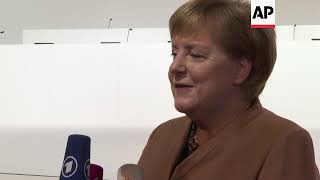 Merkel visits venue ahead of CDU convention