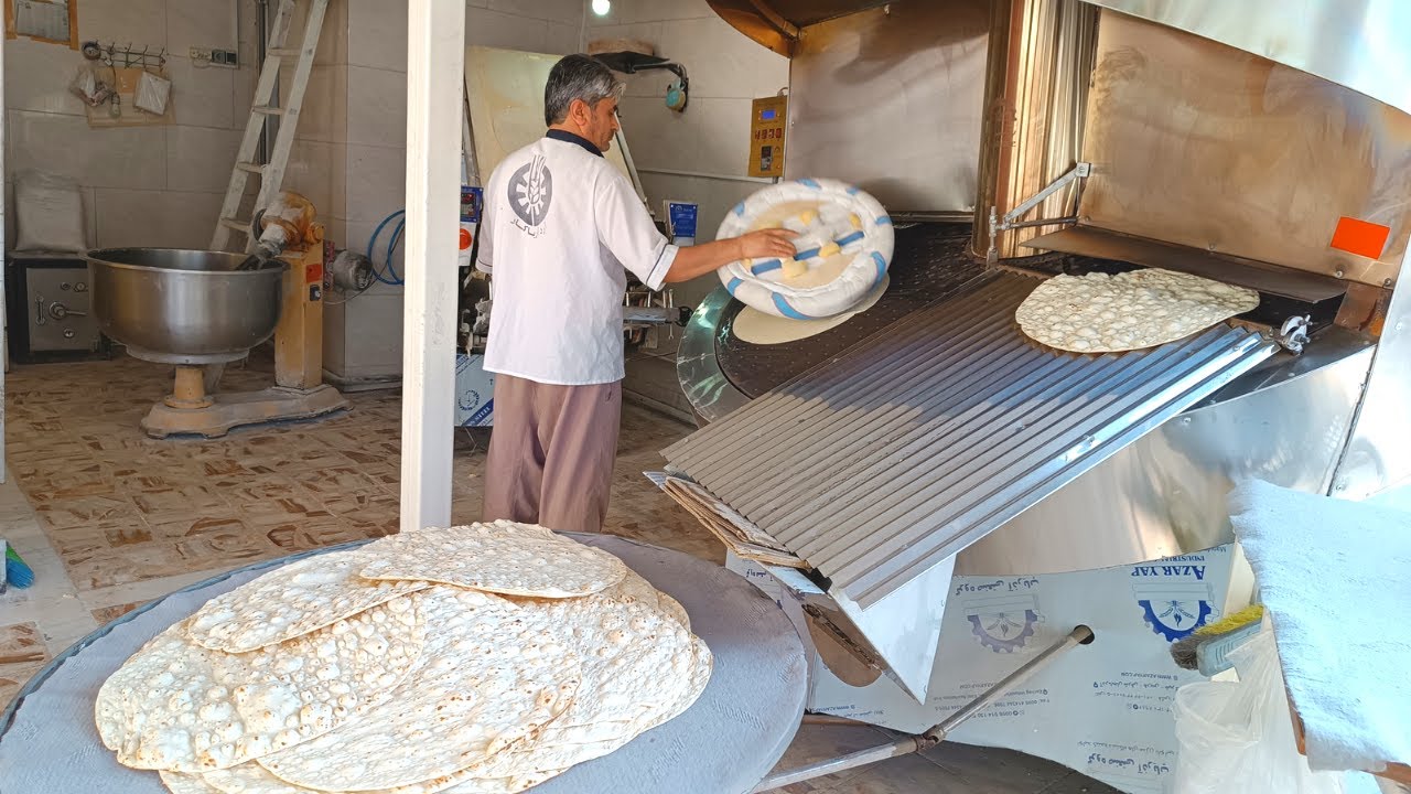Baking Tufton bread in Iran|how to prepare delicious Iranian bread and bake it with modern machines