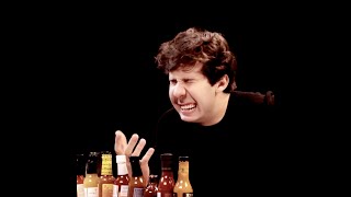 david dobrik suffering through Hot Ones