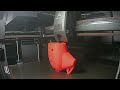 3-D printing an Ocarina with a Creality K2 in Red.