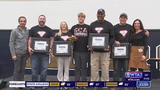 Coaching staff honored for saving life of student athlete after nearly fatal hit