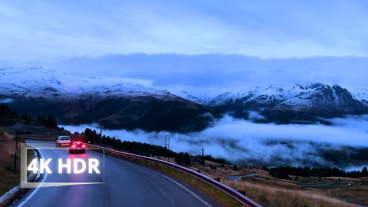 Alpine Morning Descent: Fog to Snow-Capped Mountains (4K HDR Truck Drive)