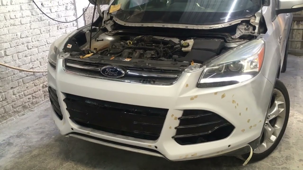 Como quitar defensa (Facia) delantera de Escape platinum 2013