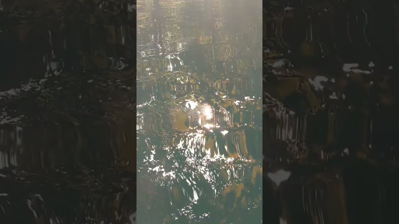 And rose a golden Light from the abyss deep 