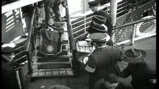 World War I U.S. Army soldiers carry injured troops out of a ship to ambulances o...HD Stock Footage