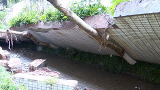 CCTV: Woman narrowly escapes wall collapse in Chongqing, China