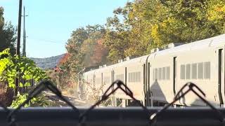 NJ Transit Train #1003 departing Lincoln Park with #4101 (NJDOT Bluebird Heritage Unit) leading