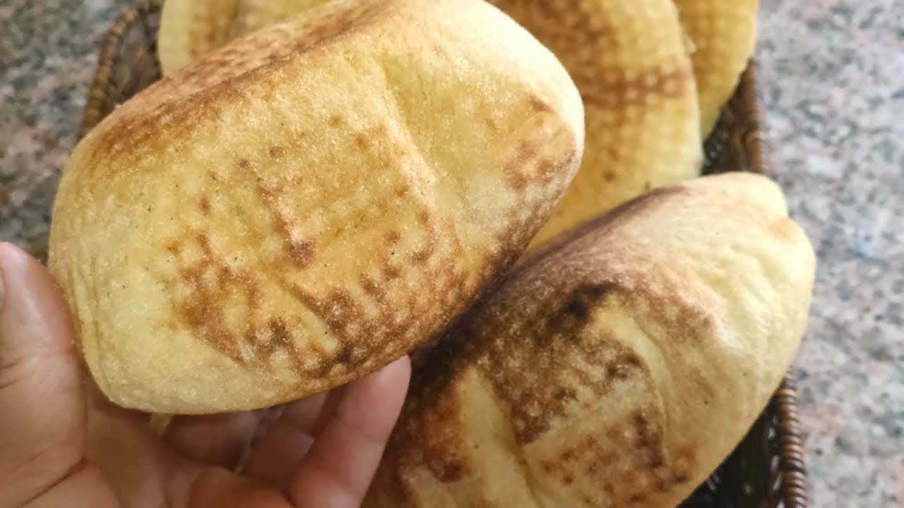 الخبز المنفوخ بالسميد يجي روعة فارغ من الداخل وخفيف ريشة بمقادير مظبوطة طريقة سهلة وبسيطة والنتيجة 👌