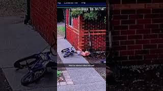 Boy riding bike wobbles and bumps head on brick wall of house Security camera
