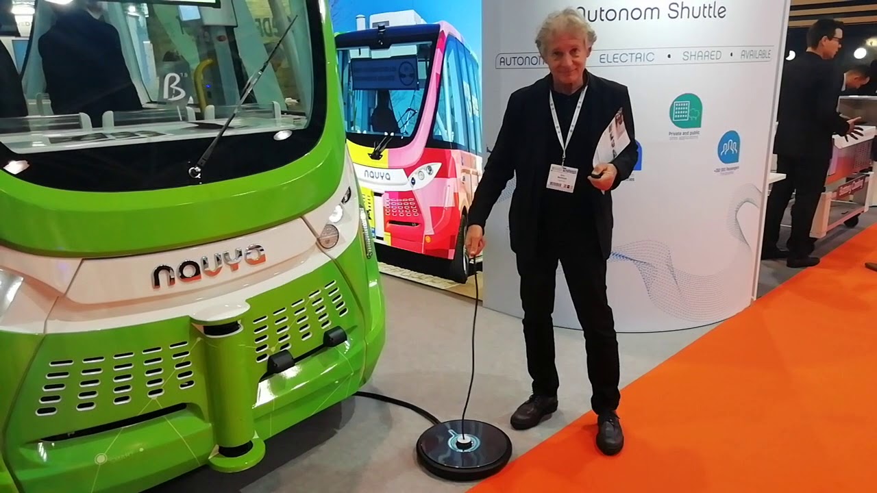 Hands-free charging with SELFPLUG at the Electric Vehicle Symposium