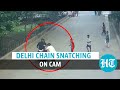 Watch delhi chain snatching govt staffer shoved robbed  crime on cctv