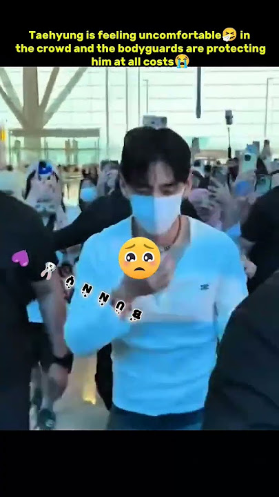Taehyung is feeling uncomfortable🤧 in the crowd and the bodyguards are protecting him at all costs 😭