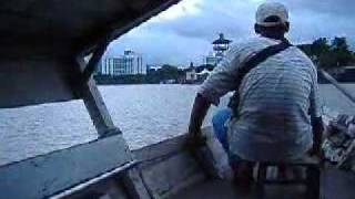 Sampan crossing Sungai Sarawak
