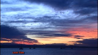 Sunset and SuperMoon Full Moon at Scarborough Marina. Queensland. Australia 27 April 2021