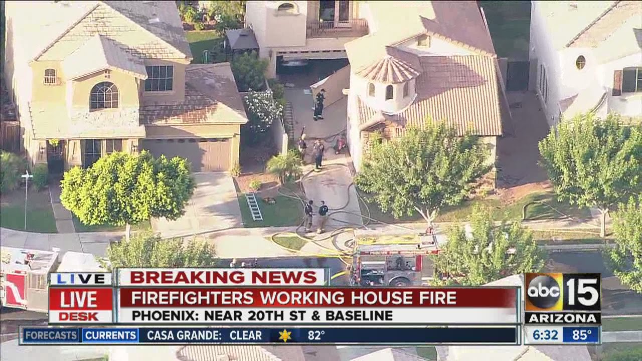 Officials battle house fire in South Phoenix - YouTube
