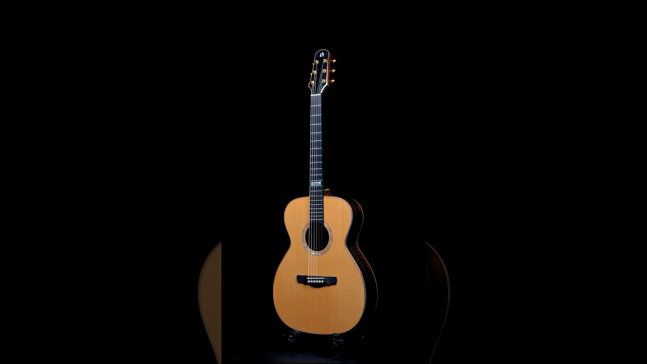 Natasha OM7 acoustic guitar 