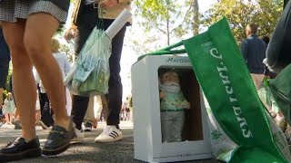 Patrons show off favorite souvenirs at The Masters gift shop