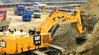 Excavator Caterpillar 6015B Loading Trucks With Help Of Hydraulic Hammer & Dozer - Sotiria