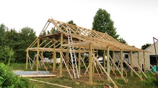 Pole barn construction with two guys and a tractor. In this video we show the pole barn framing. This is part 2 of our pole barn 