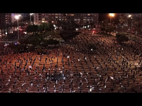 Israelis socially distance at protest against Benjamin Netanyahu amid coronavirus crisis Israelis socially distance at protest against Benjamin Netanyahu amid coronavirus crisis