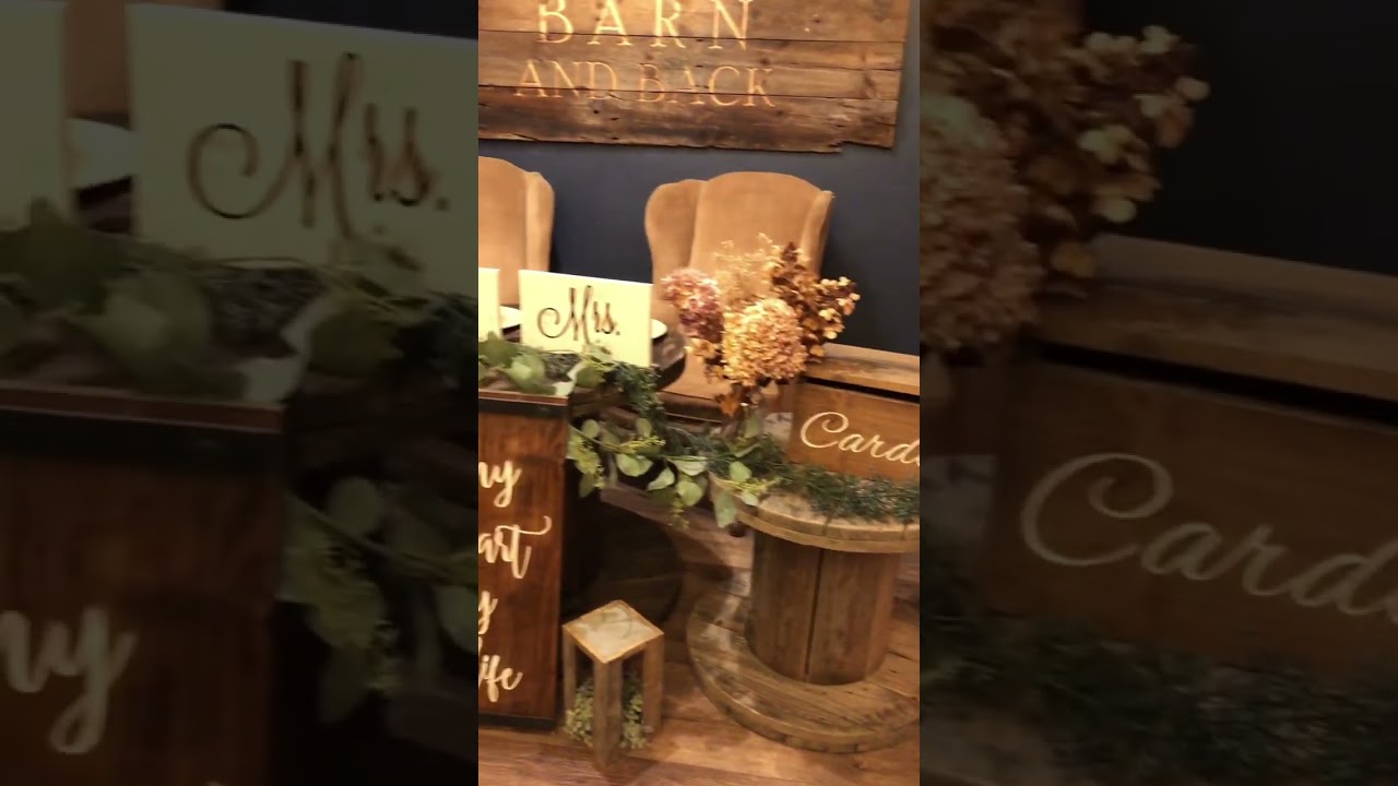 Wedding venue rustic style boho couples area seating for reception mr and Mrs card boxes barn wood