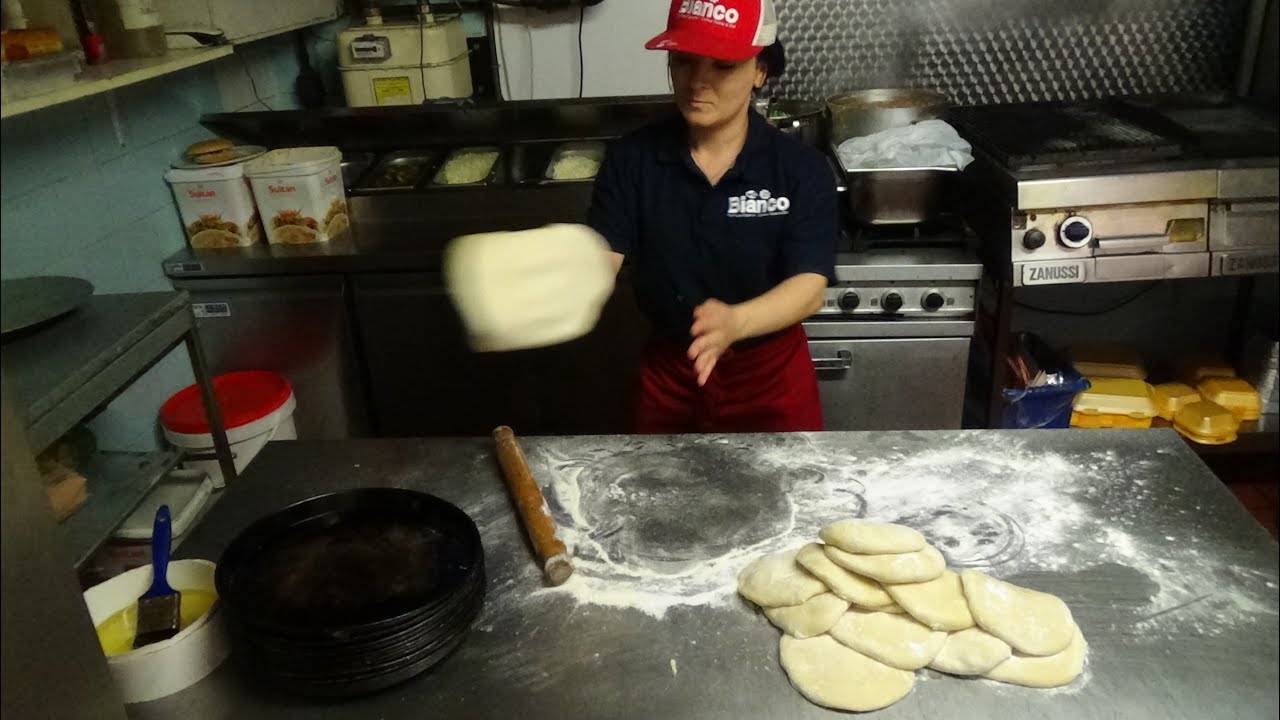 Freshly Made Arabic Bread Fatayer Pizza Falafel Hummus Pickles Freshly Made Arabic Bread Fatayer Pizza Falafel Hummus Pickles
