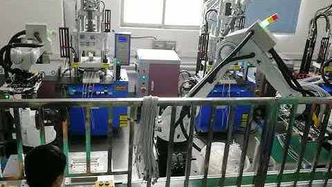 Robot for injection molding machine material loading and unloading- iPhone cable injection