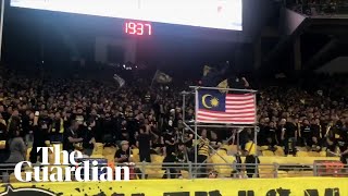 Malaysia fans perform collective chants before game with Indonesia