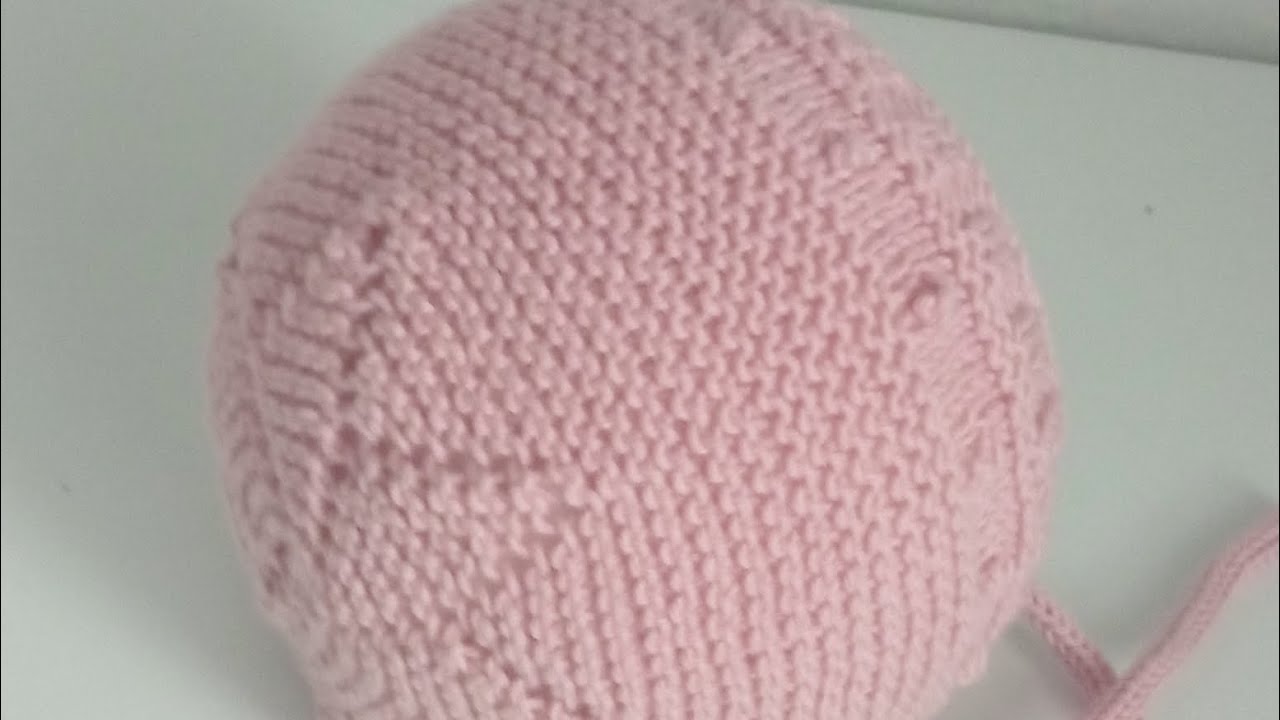 Capota estrella con bodoques muy facil de tejer.0-12 meses