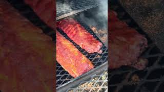 Smoking some pork ribs #porkribs #bbq #millertime #beer #kinders #turtlebox #bbqmeat