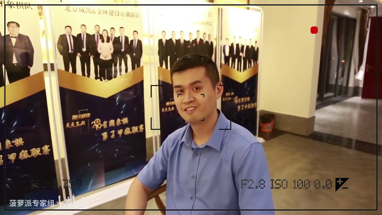 Wang Tianyi speaking in a tournament interview