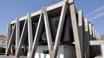 Why is the Inclined Column design used in structures?