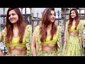 Dalljiet kaur flaunts her toned abs in green lehenga at karishma tanna mehendi ceremony