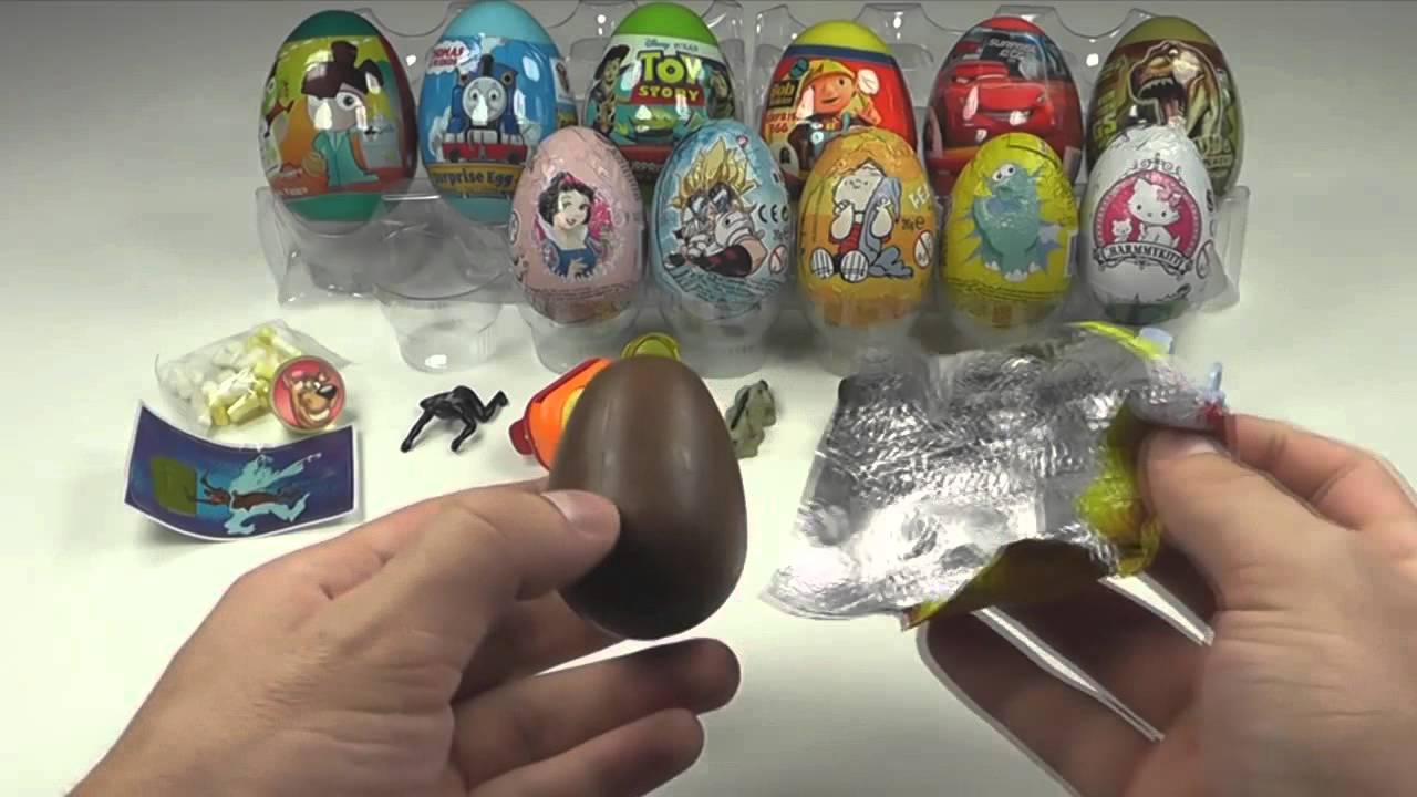 Шоколадное яйцо с сюрпризом игрушки. Алекс Киндер Тойс Киндер сюрприз. Яйцо шоколадное Luigi Zaini. Zaini шоколадные яйца игрушка.
