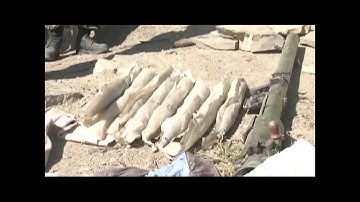 U.S. and Afghan soldiers discover a weapons cache in Afghanistan