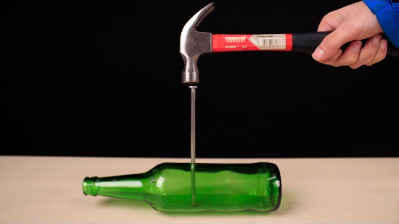 how to put a nail through a glass bottle