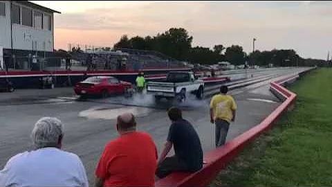 Hellcat races Jon Kaase powered F350 Must see.