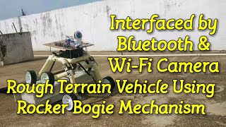 Rough Terrain Vehicle Using Rocker-Bogie Mechanism interfaced by Arduino Bluetooth & Wi-Fi Camera