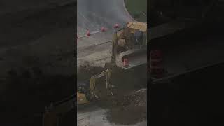 Crews work to repair sinkhole that swallowed car at busy intersection Profile