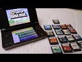 Nintendo DSi XL with original games, charger and case