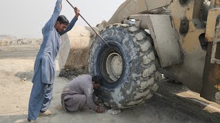 Caterpillar Wheel Loader Tire Blowout! | Extreme Mountain Mining \u0026 Repair