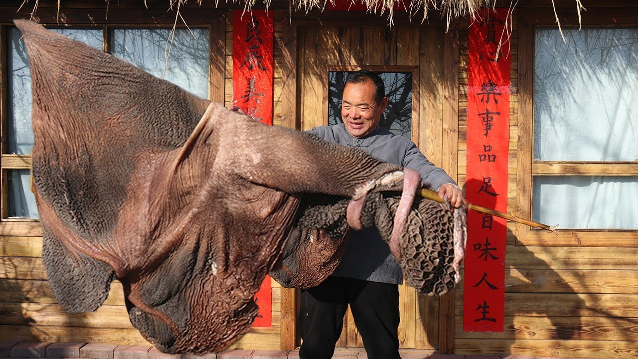 Живот скота, приготовленный и подаваемый с соусом в пекинском стиле | Дядя сельский гурман