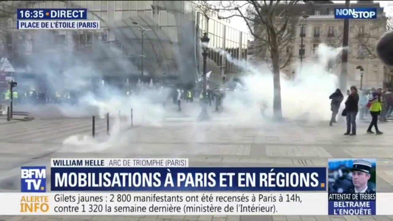 Gilets jaunes: premiers tirs de gaz lacrymogènes en haut des Champs-Élysées bfmtv i shot the sheriff