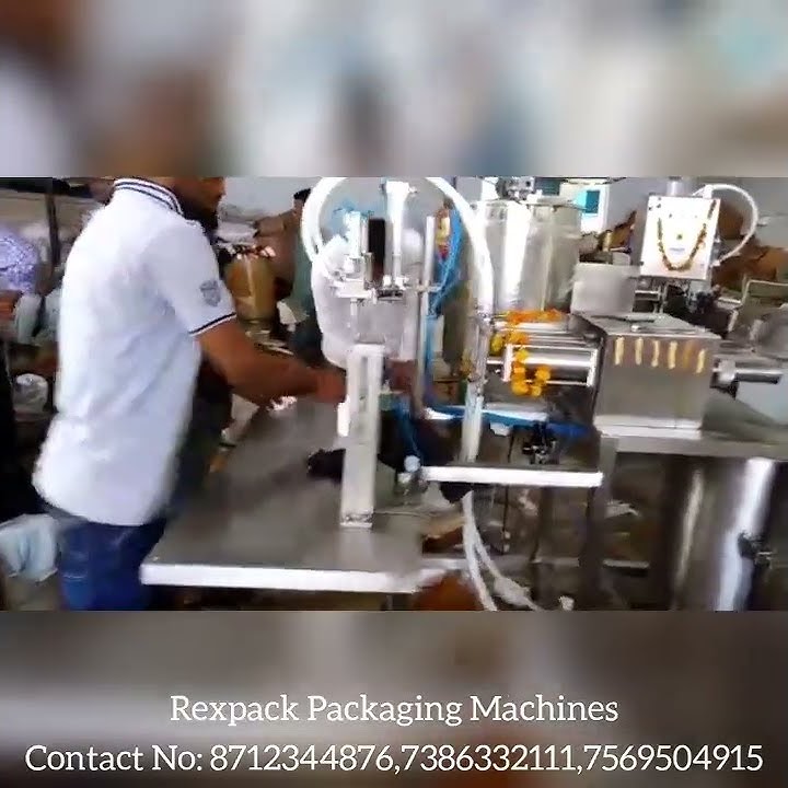 Semi-Automatic Two Head Pesticide Liquid Bottle Filling Machine (Pnuematic)  www.rexpack.in